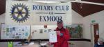 Rtn Peter Conrad with his Certificate after completing the 6 mile walk for District 1200